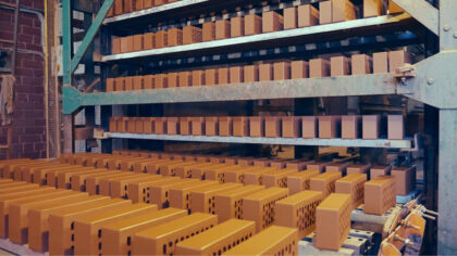Industrial drying installation with stacked bricks in a factory hall